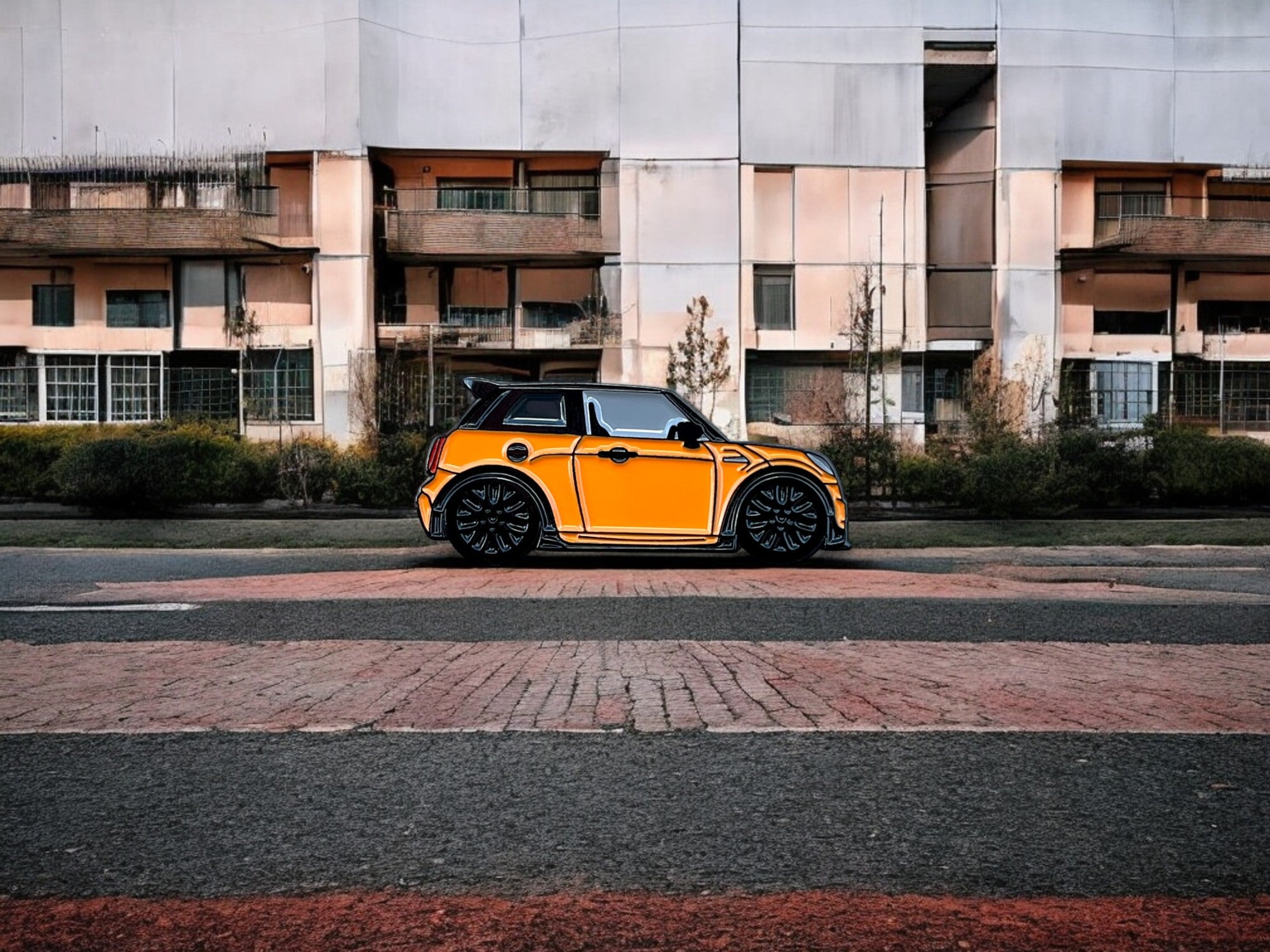 Orange MINI Cooper S JCW soft enamel pin badge — angled view
