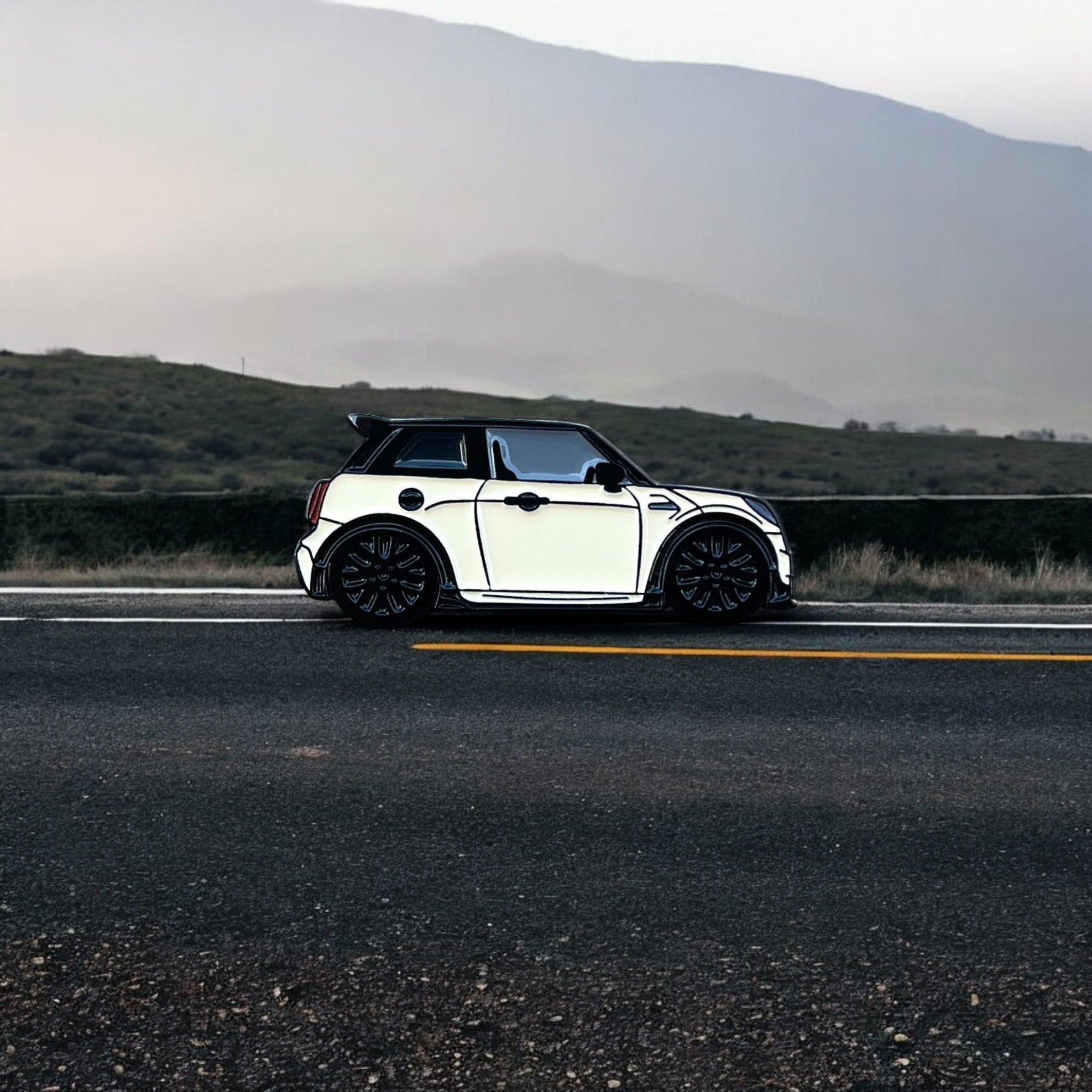 Cream white MINI Cooper S JCW soft enamel pin badge — angled view