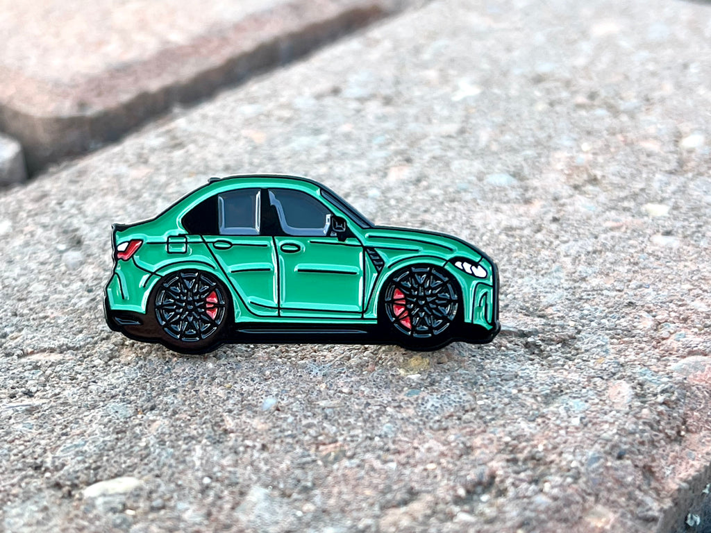 Isle of Man Green BMW M3 G80 pin badge — detail view