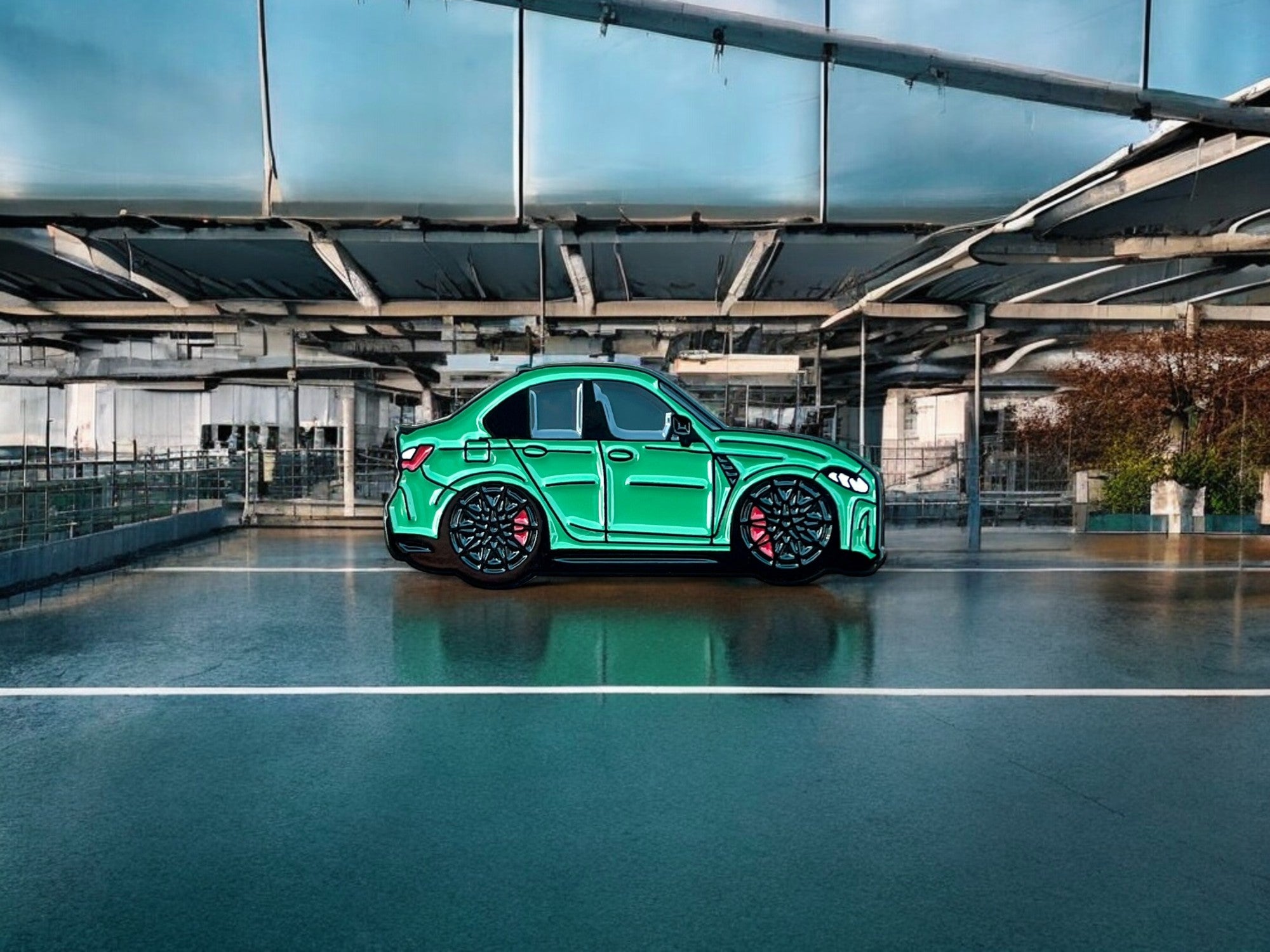 Isle of Man Green BMW M3 G80 pin badge — angled view