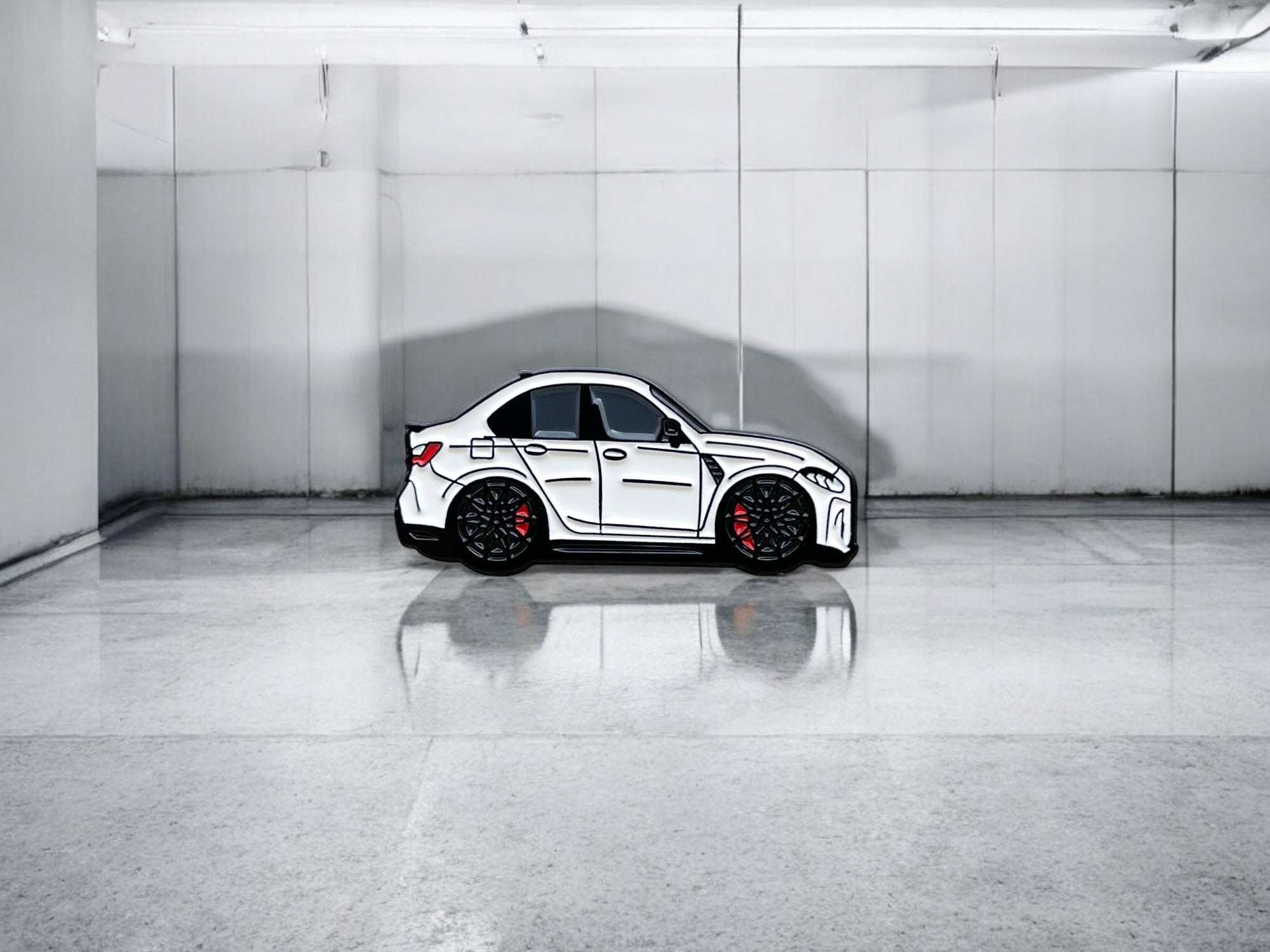 Alpine White BMW M3 G80 pin badge — angled view