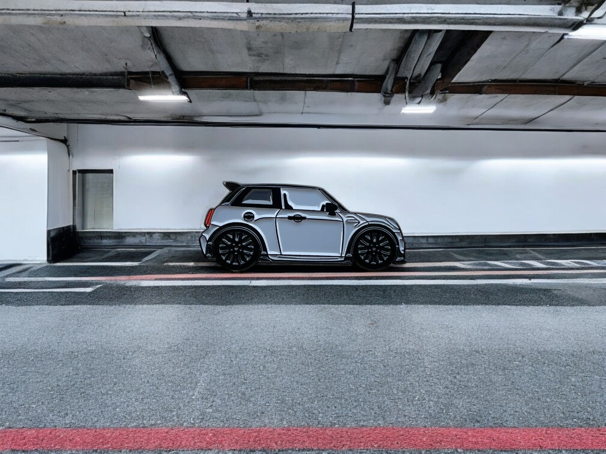 Grey MINI Cooper S JCW soft enamel pin badge — angled view