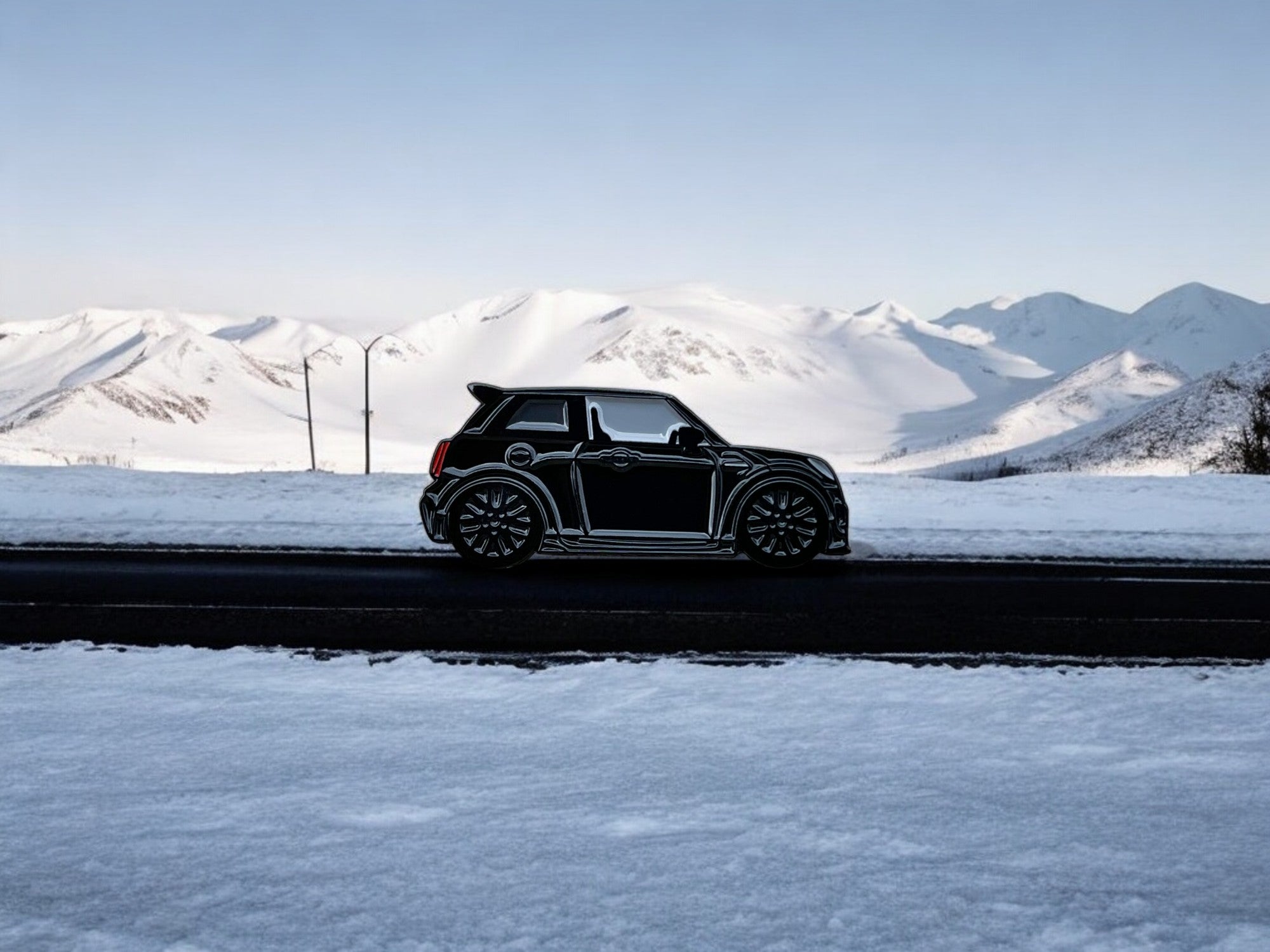 Black MINI Cooper S JCW soft enamel pin badge — angled view