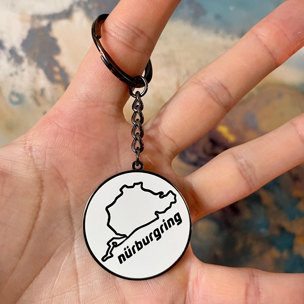 Nurburgring circuit outline hard enamel keyring — detail view