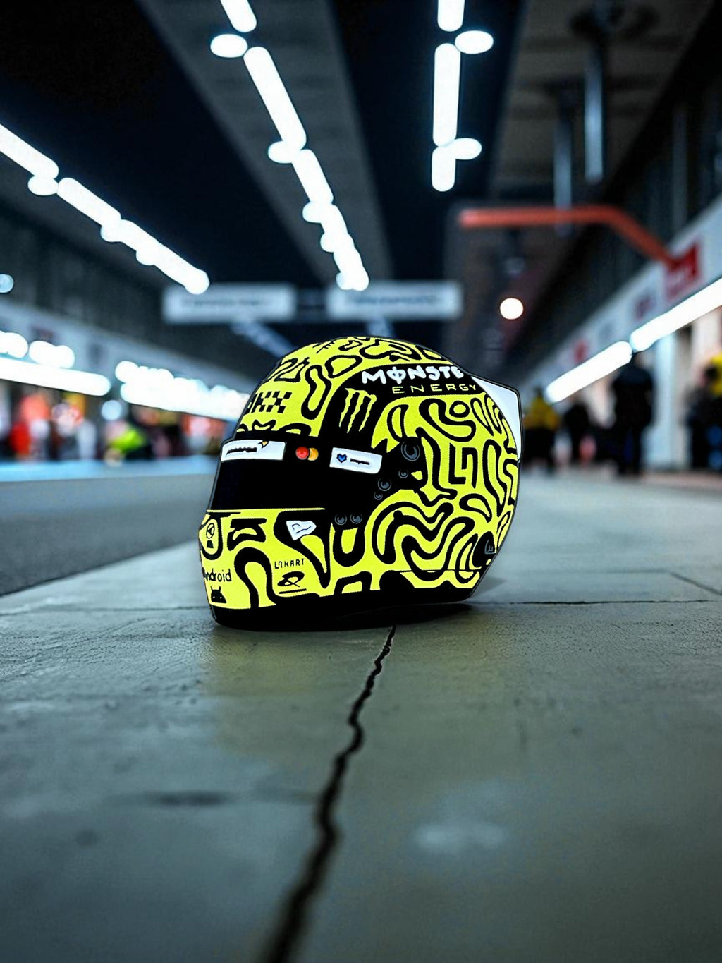 Lando Norris F1 helmet soft enamel pin badge — angled view