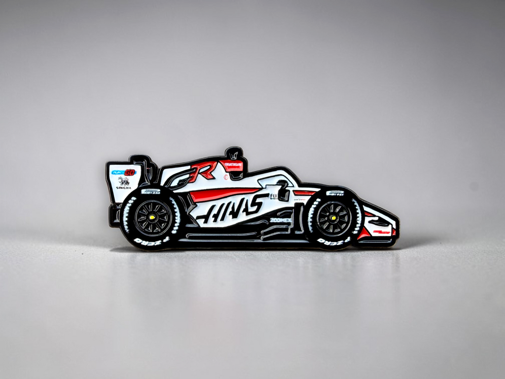 Haas VF-26 2026 F1 car soft enamel pin — angled view