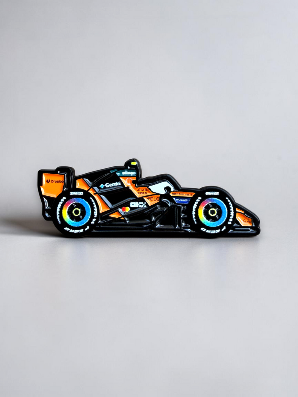 McLaren MCL40 2026 F1 car soft enamel pin — angled view