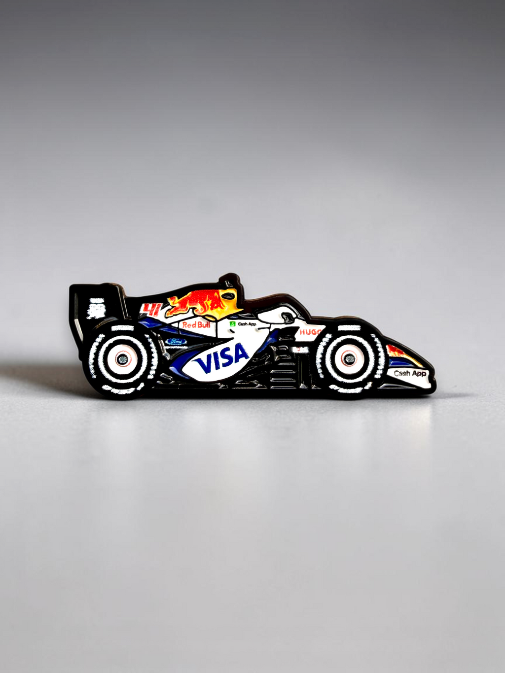 Racing Bulls VCARB 03 2026 F1 car soft enamel pin — angled view