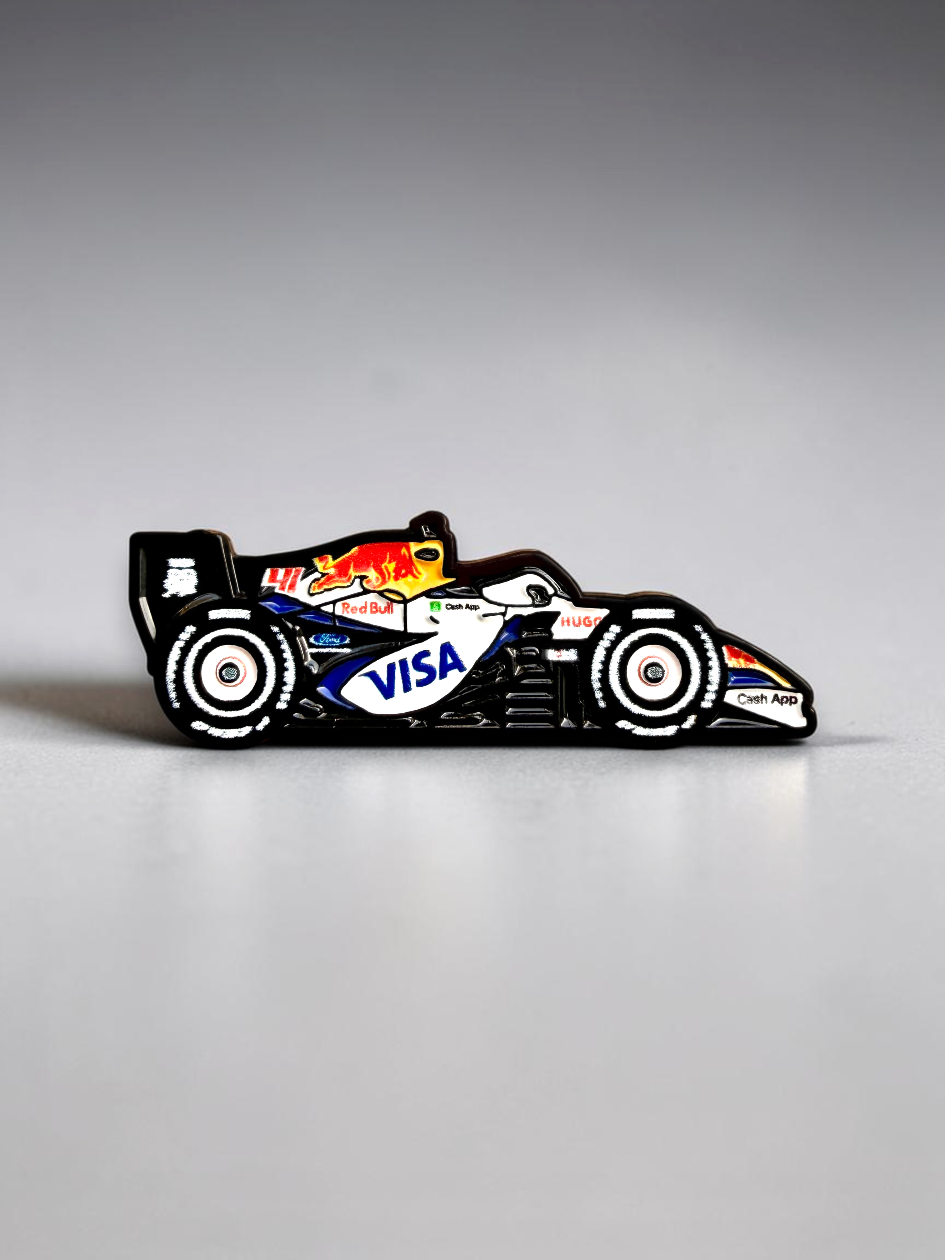 Racing Bulls VCARB 03 2026 F1 car soft enamel pin — angled view