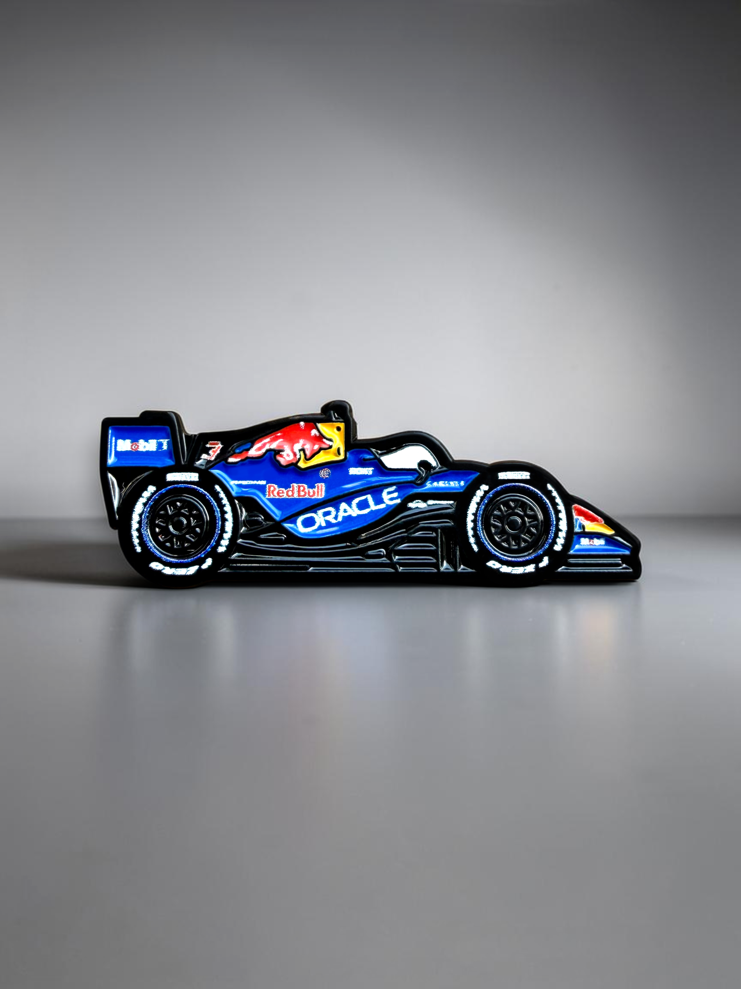 RB22 2026 F1 car soft enamel pin — angled view